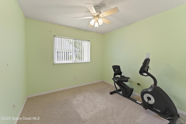 1773 Sun Gazer Dr, Rockledge, FL 32955 - exercise area featuring carpet flooring, baseboards, and ceiling fan