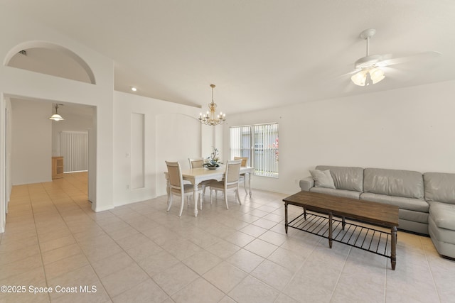 1773 Sun Gazer Dr, Rockledge, FL 32955 - living area with baseboards, ceiling fan with notable chandelier, and light tile patterned floors