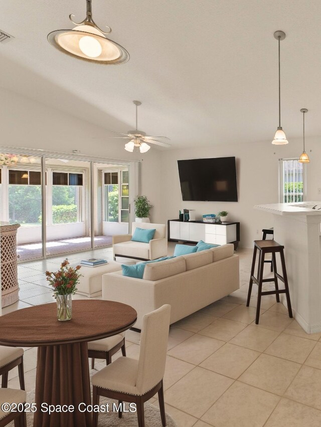 1773 Sun Gazer Dr, Rockledge, FL 32955 - living area with plenty of natural light, visible vents, light tile patterned floors, and ceiling fan