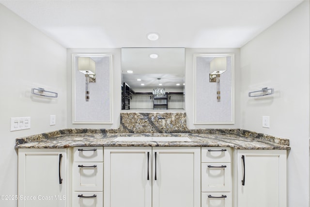 300 S Sykes Creek Pkwy Unit 106, Merritt Island, FL 32952 - bathroom featuring recessed lighting and vanity