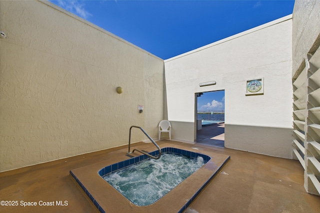 300 S Sykes Creek Pkwy Unit 106, Merritt Island, FL 32952 - view of pool featuring a hot tub