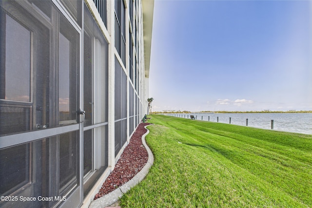 300 S Sykes Creek Pkwy Unit 106, Merritt Island, FL 32952 - view of yard with a water view