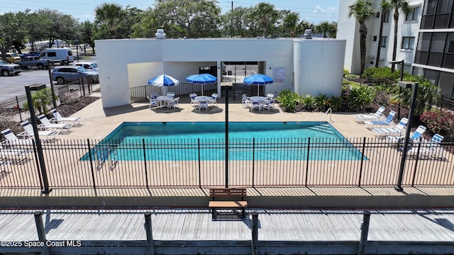 300 S Sykes Creek Pkwy Unit 106, Merritt Island, FL 32952 - community pool with fence and a patio