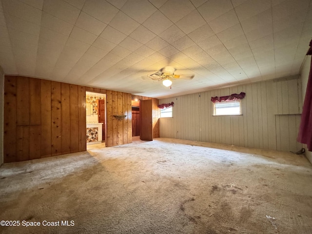 690 Lemon Grove Ave, Melbourne, FL 32904 - carpeted empty room featuring wood walls