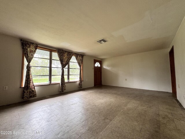 690 Lemon Grove Ave, Melbourne, FL 32904 - empty room featuring healthy amount of natural light