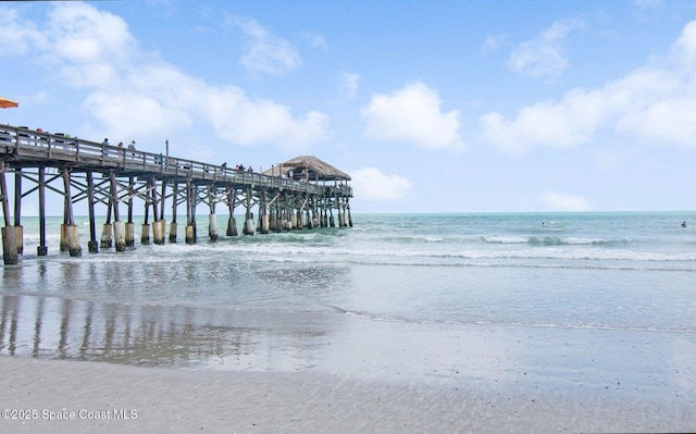 5350 Ocean Beach Blvd Unit 212, Cocoa Beach, FL 32931 - view of community featuring a pier and a water view