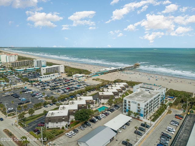 5350 Ocean Beach Blvd Unit 212, Cocoa Beach, FL 32931 - drone / aerial view featuring a view of the beach and a water view