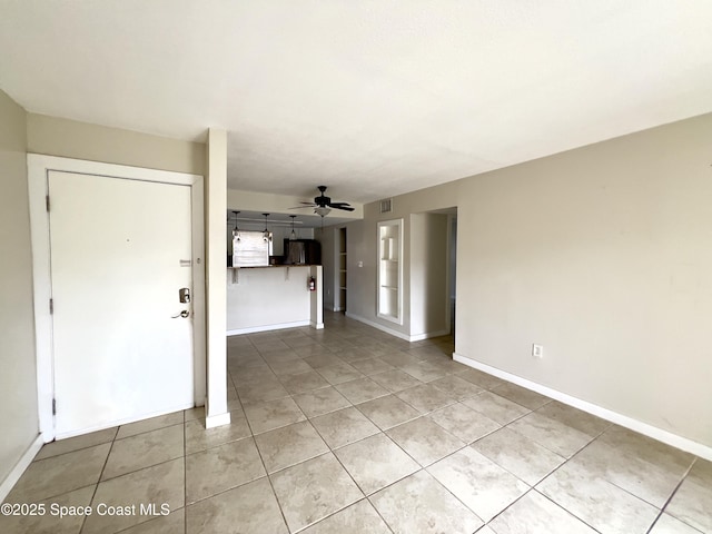 151 Ulster Ln, Melbourne, FL 32935 - unfurnished living room with baseboards, ceiling fan, light tile patterned floors, and visible vents