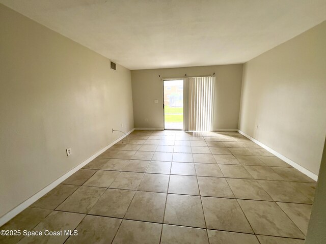 151 Ulster Ln, Melbourne, FL 32935 - unfurnished room with light tile patterned floors, baseboards, and visible vents