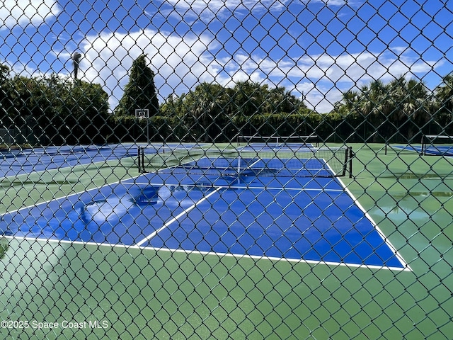 151 Ulster Ln, Melbourne, FL 32935 - view of sport court featuring fence