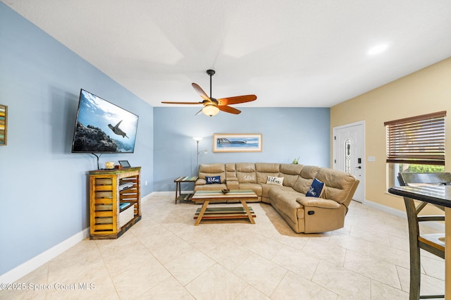 131 Harding Avenue 131& 129, Cocoa Beach, FL 32931 - living room featuring ceiling fan, baseboards, and light tile patterned floors