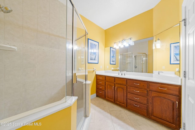 131 Harding Avenue 131& 129, Cocoa Beach, FL 32931 - full bath with a shower stall, double vanity, and tile patterned floors