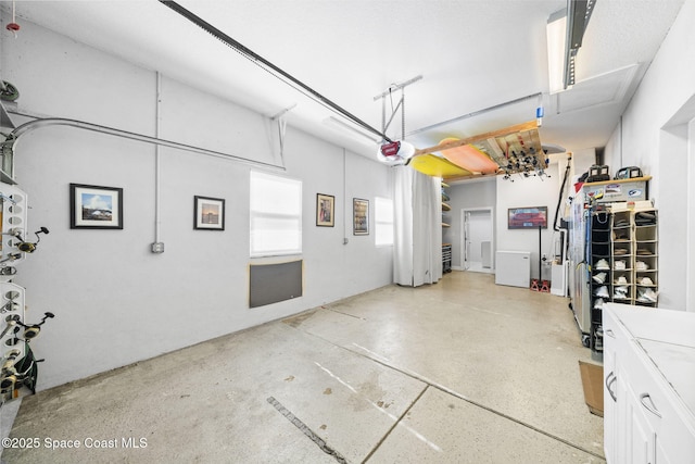 131 Harding Avenue 131& 129, Cocoa Beach, FL 32931 - garage with a garage door opener
