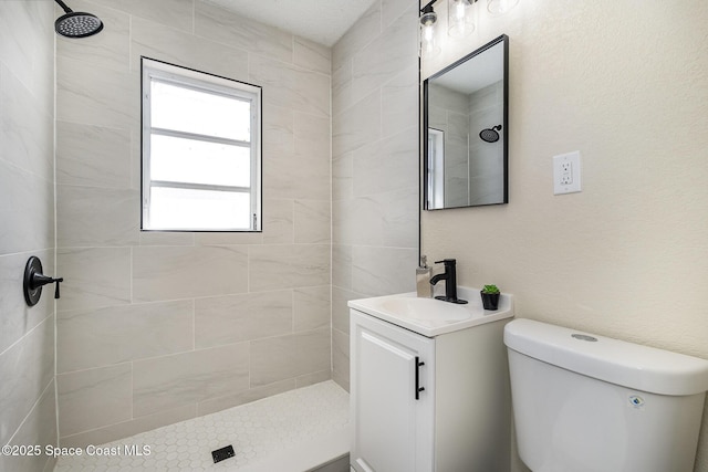 1107 Woodlawn Rd, Rockledge, FL 32955 - full bath with a tile shower, toilet, and vanity