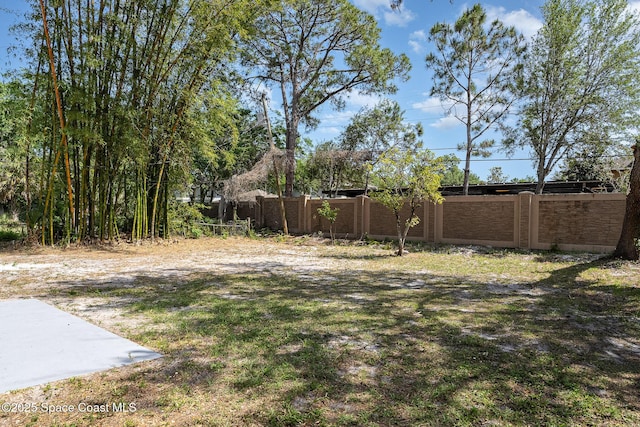 1107 Woodlawn Rd, Rockledge, FL 32955 - view of yard with fence
