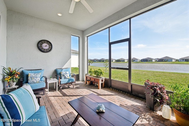 2241 Caravan Pl, Melbourne, FL 32940 - sunroom / solarium featuring a ceiling fan, a residential view, and an outdoor living space