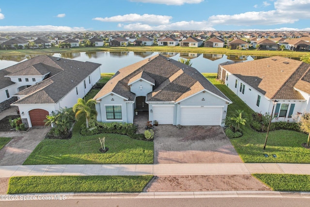 2241 Caravan Pl, Melbourne, FL 32940 - aerial view of residential area featuring a large body of water