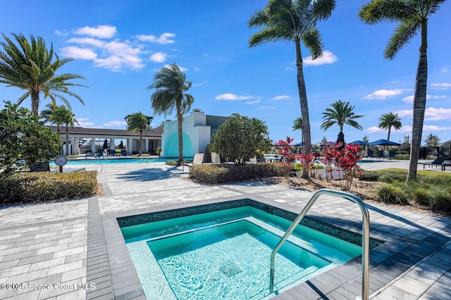 2241 Caravan Pl, Melbourne, FL 32940 - community pool with a hot tub and a patio