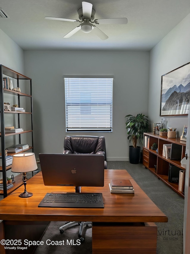 2241 Caravan Pl, Melbourne, FL 32940 - carpeted office with a ceiling fan