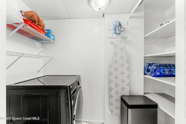 laundry room with independent washer and dryer