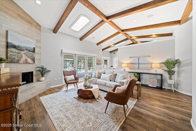 117 Windward Way, Indian Harbour Beach, FL 32937 - living room with a premium fireplace, recessed lighting, vaulted ceiling with beams, and baseboards