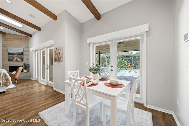 117 Windward Way, Indian Harbour Beach, FL 32937 - dining space with beam ceiling, french doors, dark wood-style floors, and baseboards