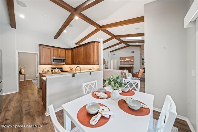 117 Windward Way, Indian Harbour Beach, FL 32937 - dining space featuring dark wood-style floors, recessed lighting, vaulted ceiling with beams, and baseboards