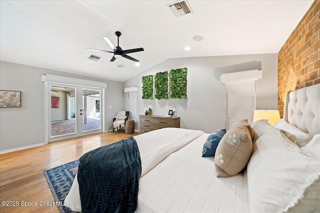 117 Windward Way, Indian Harbour Beach, FL 32937 - bedroom featuring hardwood / wood-style floors, visible vents, access to outside, and lofted ceiling