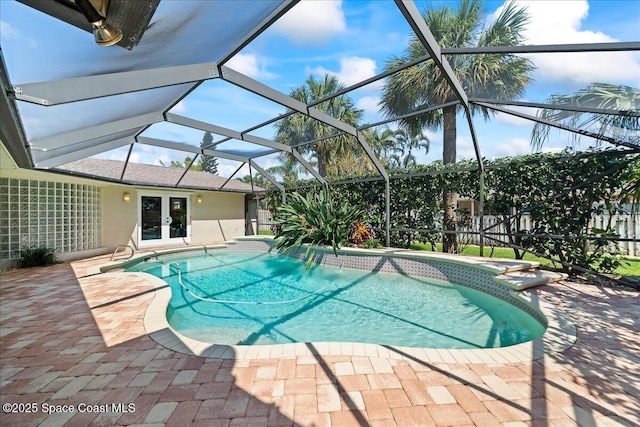 117 Windward Way, Indian Harbour Beach, FL 32937 - outdoor pool featuring a patio, french doors, and a lanai