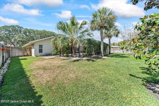 117 Windward Way, Indian Harbour Beach, FL 32937 - view of yard featuring a fenced backyard