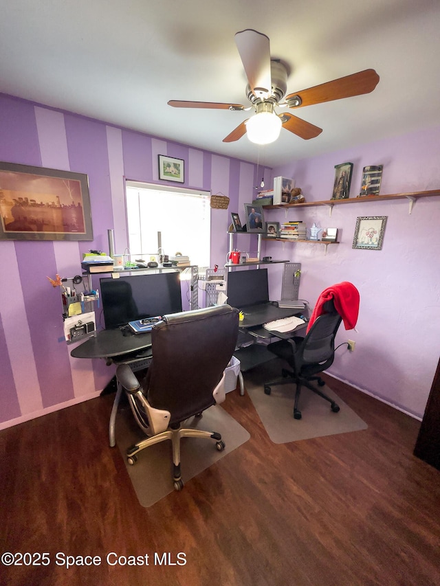 office space featuring a ceiling fan and wood finished floors