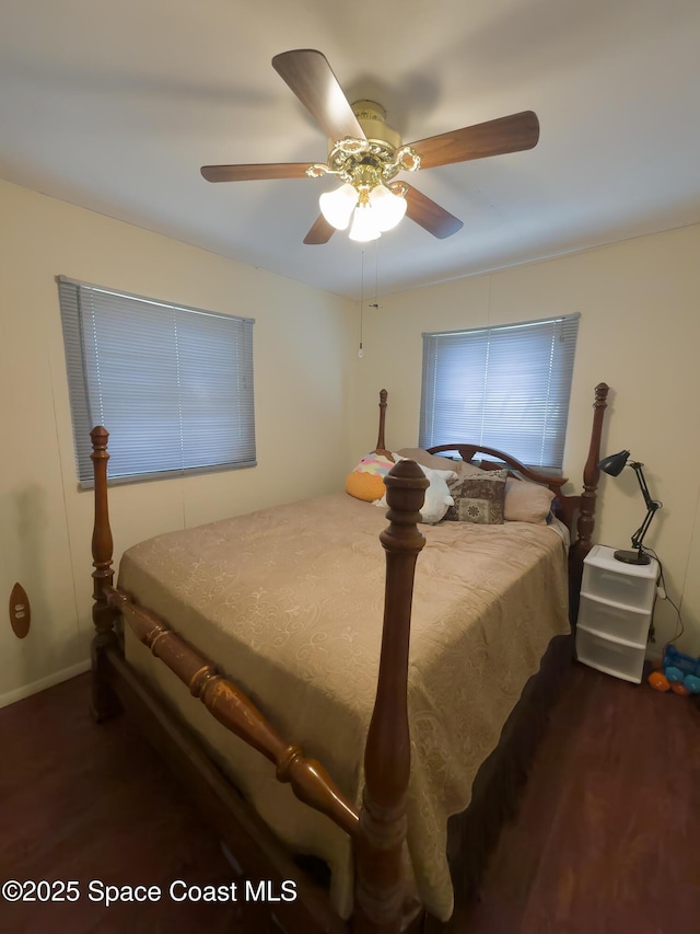 bedroom with baseboards, a ceiling fan, and wood finished floors