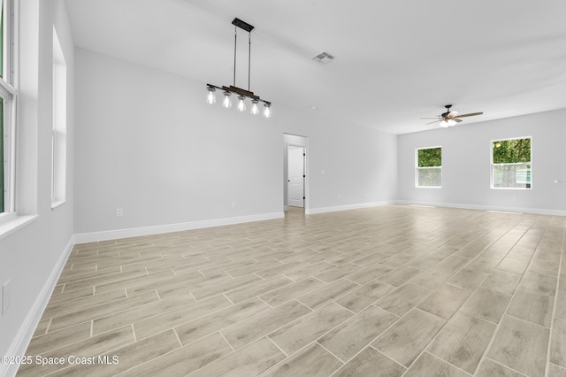 8276 100th Ave, Vero Beach, FL 32967 - empty room with a ceiling fan and light wood-type flooring
