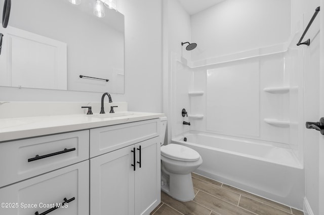 8276 100th Ave, Vero Beach, FL 32967 - full bath featuring vanity, wood finish floors, and bathing tub / shower combination