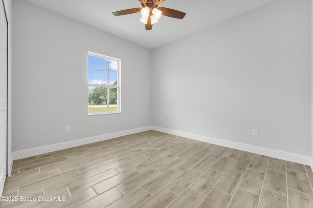 8276 100th Ave, Vero Beach, FL 32967 - spare room featuring wood finish floors and ceiling fan