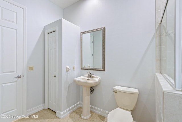 4117 Melrose Ct, Melbourne, FL 32940 - full bath with baseboards, toilet, and tile patterned flooring