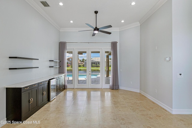 4117 Melrose Ct, Melbourne, FL 32940 - unfurnished living room featuring beverage cooler, recessed lighting, visible vents, french doors, and crown molding