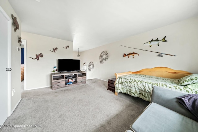 carpeted bedroom with baseboards