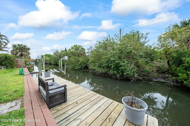 view of dock with a water view