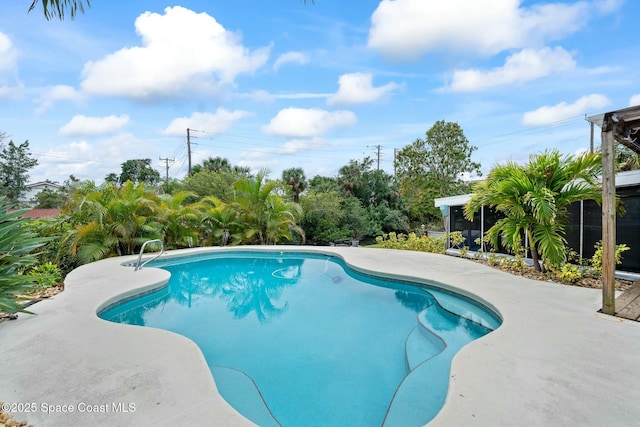 outdoor pool featuring a patio area