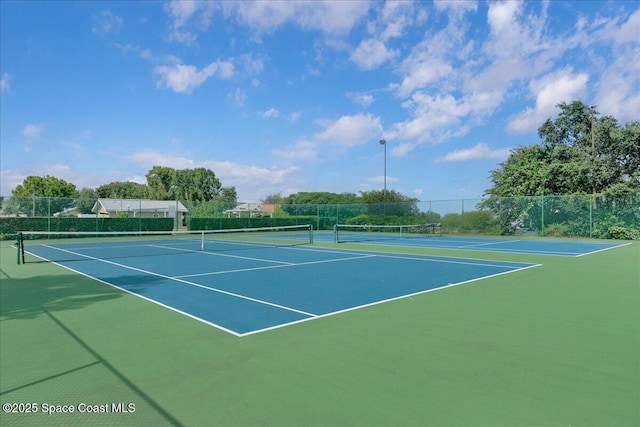 958 Chace Ln NE, Palm Bay, FL 32905 - view of tennis court featuring community basketball court