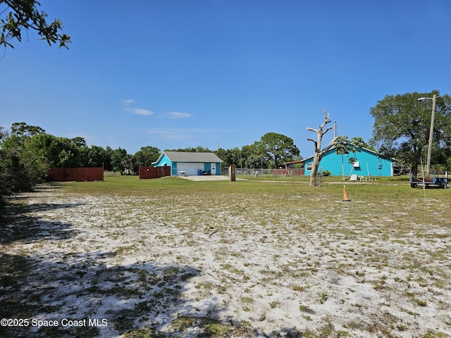 view of yard featuring fence