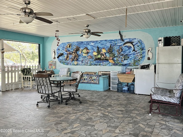 view of patio / terrace featuring ceiling fan and outdoor dining area