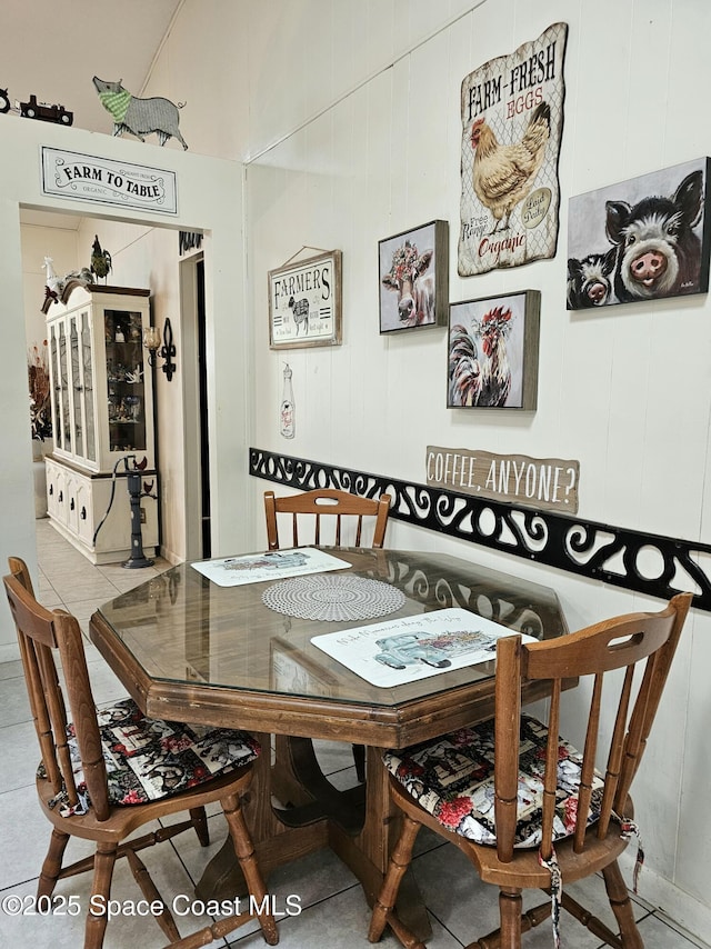 dining space featuring tile patterned floors