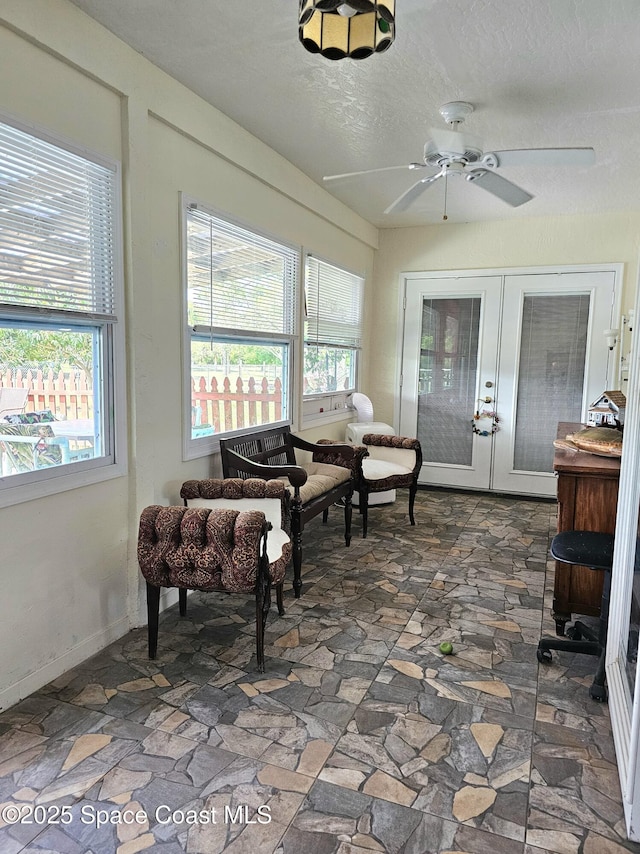 sunroom featuring french doors