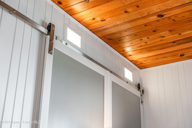 860 S Banana River Dr, Merritt Island, FL 32952 - details featuring wooden ceiling and a barn door