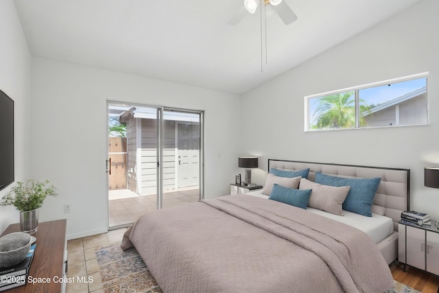 bedroom featuring access to outside, a ceiling fan, lofted ceiling, and tile patterned floors