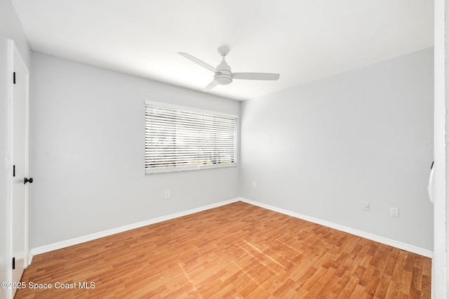 6010 Flamingo Ave, Cocoa, FL 32927 - spare room with light wood-style flooring, baseboards, and ceiling fan