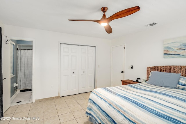 6010 Flamingo Ave, Cocoa, FL 32927 - bedroom featuring a ceiling fan, light tile patterned flooring, visible vents, and a closet