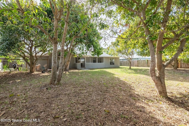 6010 Flamingo Ave, Cocoa, FL 32927 - view of yard featuring a fenced backyard